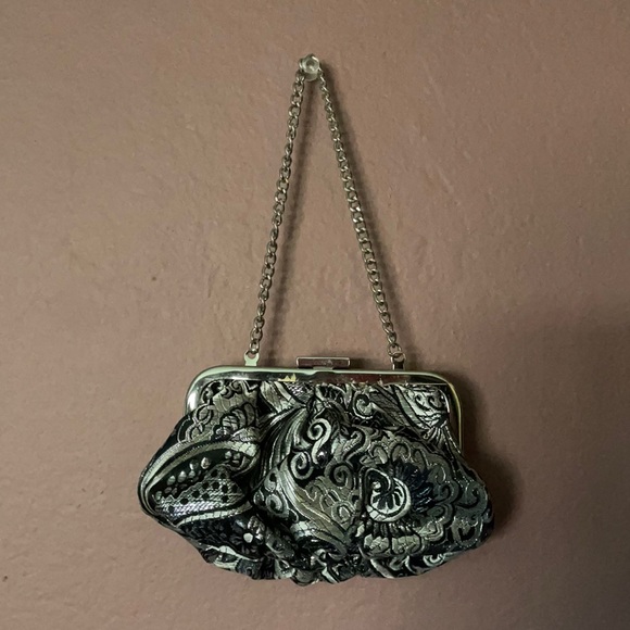 Fancy WHBM silver and black wristlet with snap closure